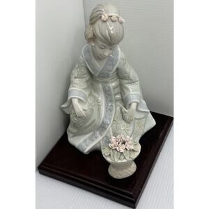 Vintage Porcelain JAPANESE GEISHA with FLOWERS 8"h Figurine on Wood Base